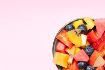Colorful fruit salad in a bowl.