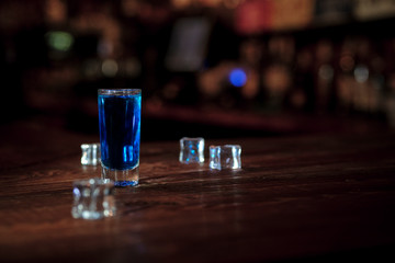 Coctail stays on a wood desk bar