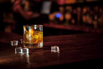 Coctail stays on a wood desk bar