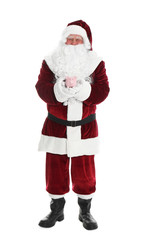 Santa Claus holding piggy bank on white background