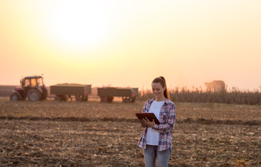Farmer woman at corn harvest
