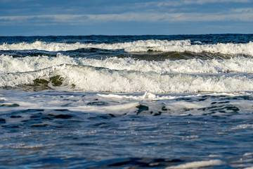 Heavy surf rolling in on a northern beach.