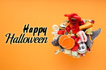 Halloween holiday card - candy bowl with candy and halloween cookies Trick or Treat	