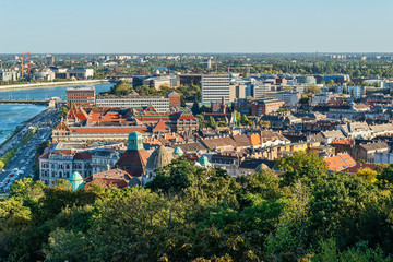 Fototapeta na wymiar Budapest, Hungary - October 01, 2019: Panoramic cityscape view of hungarian capital city of Budapest (District XI) from the Gellert Hill.