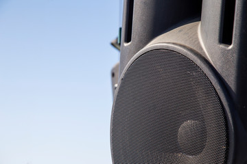 black speaker against the sky