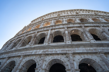 Colosseum in Rome and morning sun, Italy