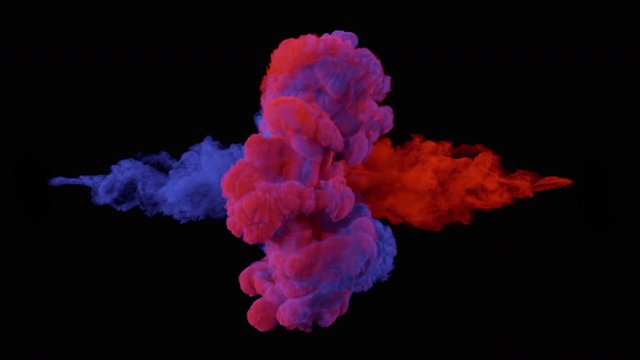 Collision of colored smoke.l. The collapse of smoke in slow motion on a black background.