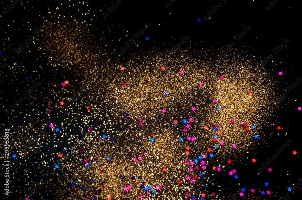 Poster christmas background with confetti and golden sparkles. blurred effect. concept for festive backgrou