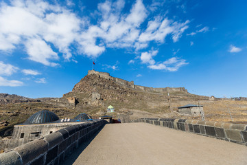 kars Castle and walls with blue sky