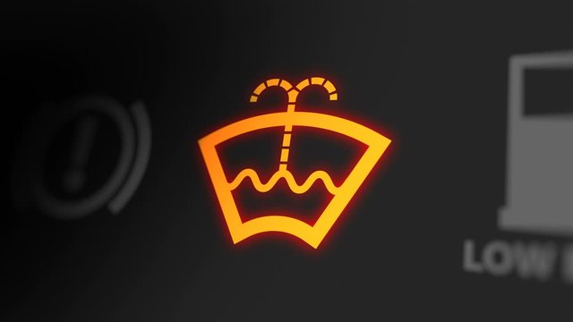 Low Windshield Washer Fluid Warning on Car Dashboard