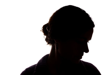 Young woman look ahead with flowing hair - silhouette