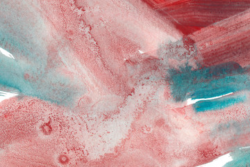 Fototapeta premium Mixed colors watercolor texture background. Hand drawn light red and turquoise smears, splashes abstract backdrop.