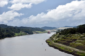 Landscape of the Panama Canal, view from the transiting cargo ship.