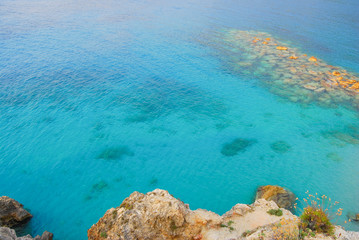 rocks and turquoise  sea