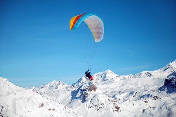 Tandem of skiers with paraglider in blue sky, France - 298961290