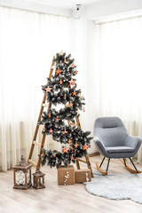 christmas tree in a stylish room.  copy space