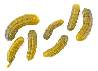 Pickled cucumbers isolated on a white background, top view. Cornichons.