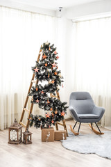 christmas tree in a stylish room.  copy space
