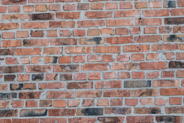 Ceramic red brick wall without plaster
