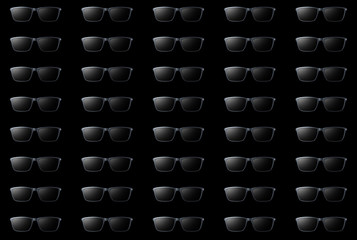 Glasses with colored highlights on a black background.