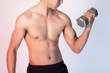 Fototapeta premium Handsome Muscular fitness man in studio