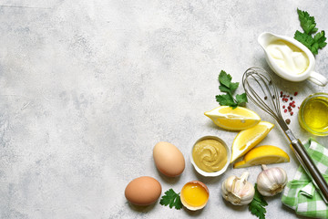 Ingredients for making mayonnaise salad dressing. Top view with copy space.
