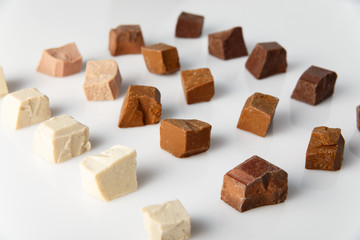 Pieces of different milk chocolate