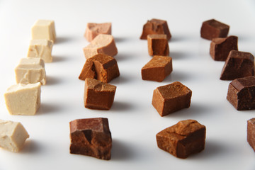 Pieces of different milk chocolate