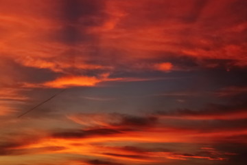 red orange blurred clouds at sunset texture background