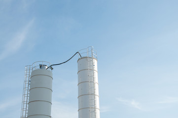 Silo for storage of cement. Storage of materials in the production of concrete.