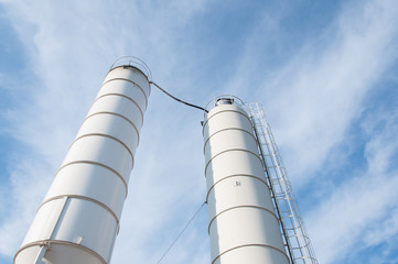 Silo for storage of cement. Storage of materials in the production of concrete.