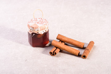  cinnamon in tubes on a gray background1