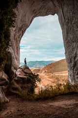 Oñati, Gipuzkoa / Spain »; October 27, 2019: A young man with a cap in La Cuevas de Ojo de Aitzulo