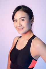 Fototapeta na wymiar Beautiful asian fitnesses woman in studio