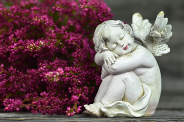 Guardian angel and pink flowers