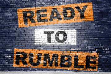 Ready to Rumble saying lettering Graffiti on Brick Wall