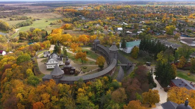 Aerial panoramic view of Baturin Castle with the Seym River in Chernihiv Oblast of Ukraine. Moving camera forward subject.