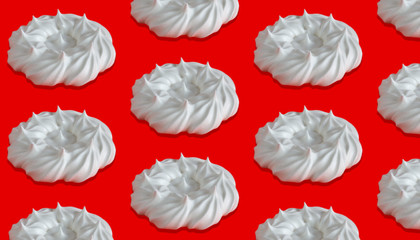The rhythmic pattern of the meringue on a red background