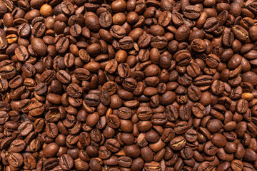 Black coffee beans closeup as a background.
