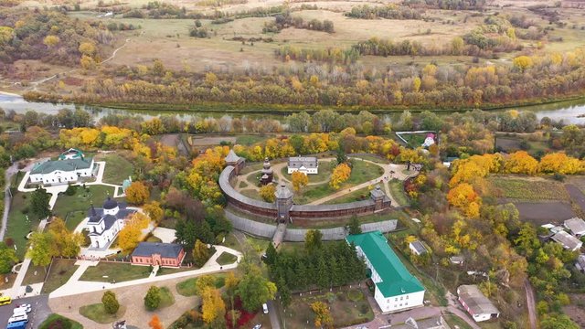 Aerial view of Baturyn Castle in Ukraine at autumn. Camera Tracking from left to right.