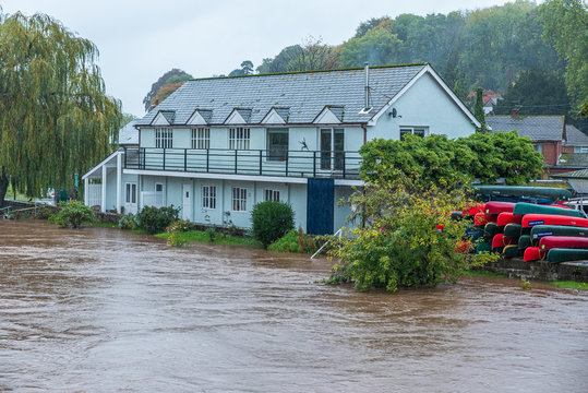 UK flooding warning. River Wye in the village Glasbury-on-Wye.