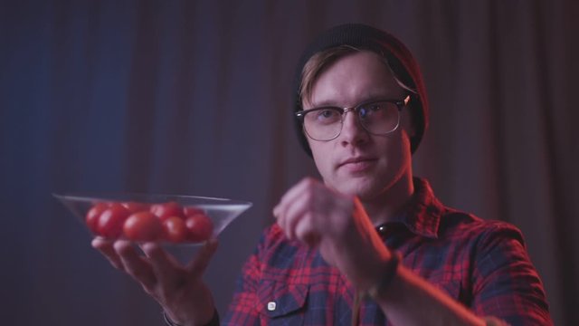 Hipster Snack Break with Cherry Tomatoes &ndash; Fun Close-Up Moment
