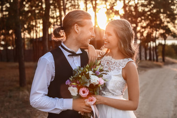 Happy couple celebrating their wedding outdoors