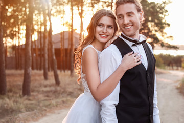 Happy couple celebrating their wedding outdoors