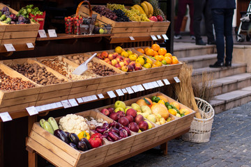 the fruit stand. Fresh healthy organic fruits, vegetables, nuts at a farmers ' market