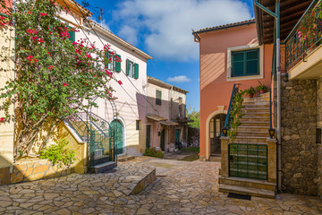 Walk the aisles Sinarades village on Corfu island - obrazy, fototapety, plakaty