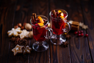 Christmas and New Year composition, holiday background with mulled wine and sweets, copy space. Winter holidays celebration concept