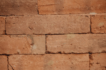 Old grunge red brick wall background texture