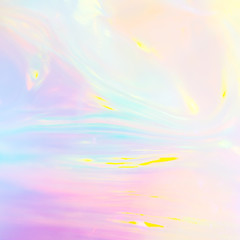Abstract iridescent image of holographic plastic material in pastel colors
