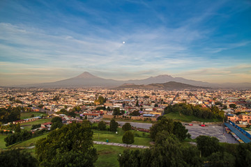 Fototapeta na wymiar Panoramic view of the city, Popocatepetl volcano, Cholula, Puebla, Mexico
